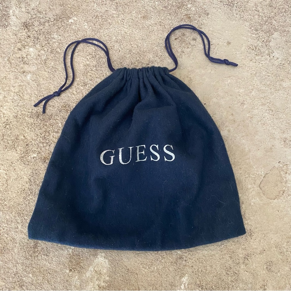 Guess felt navy blue drawstring bag.